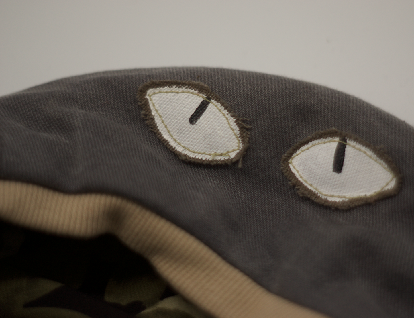 BÉRET EVIL EYE GREY